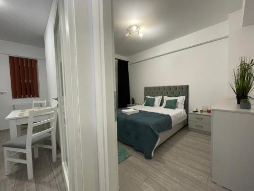 A bed or beds in a room at Luxury Charming Apartments