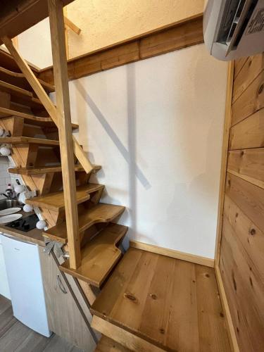 a staircase in a tiny house at Planinska Koliba ABA-TARA in Bajina Bašta