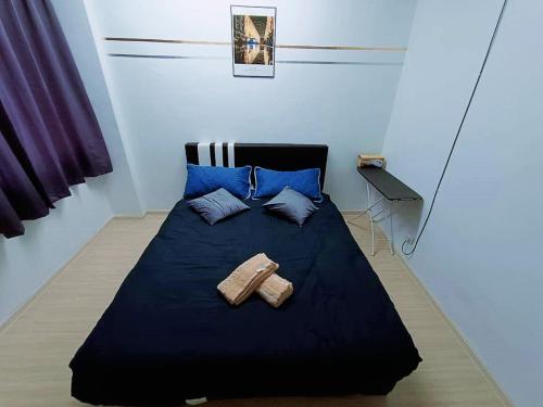 Voodi või voodid majutusasutuse Jo-Rumah 3 Bedroom Apartment Jelutong Georgetown Penang Free WIFI toas