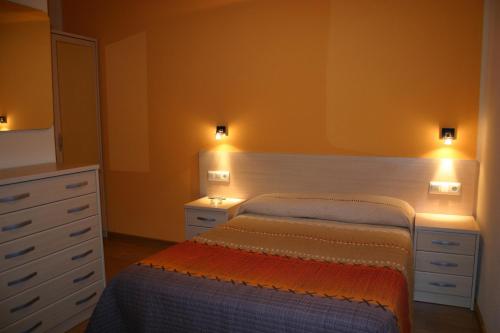 Cama o camas de una habitación en Hostal Hispanico I