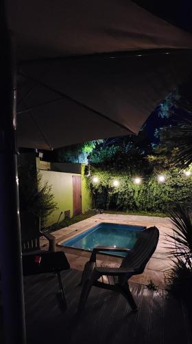 Bazén v ubytování Monoambiente en casa familiar nebo v jeho okolí