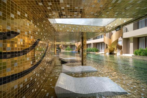 Bazén v ubytování Metadee Concept Hotel nebo v jeho okolí