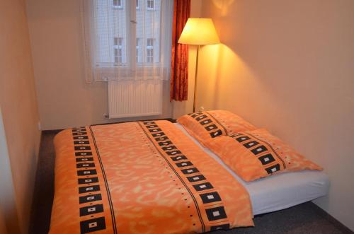 Ein Bett oder Betten in einem Zimmer der Unterkunft AB Apartments