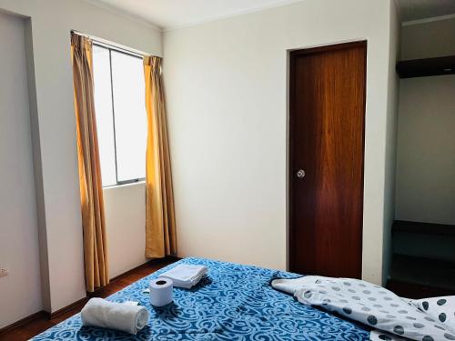 Cama o camas de una habitación en Montañero Hostel