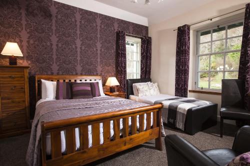 Ένα ή περισσότερα κρεβάτια σε δωμάτιο στο North Kessock Hotel