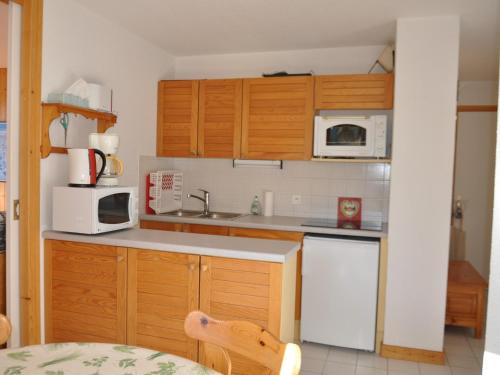 Charmant 2 pièces avec balcon et parking, proche centre et remontées mécaniques !