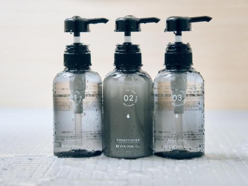 three bottles of water sitting next to each other at Via Inn Prime Kyotoeki Hachijoguchi in Kyoto