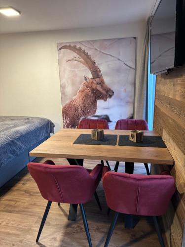 Coin salon dans l'établissement Appartments Das Franzal