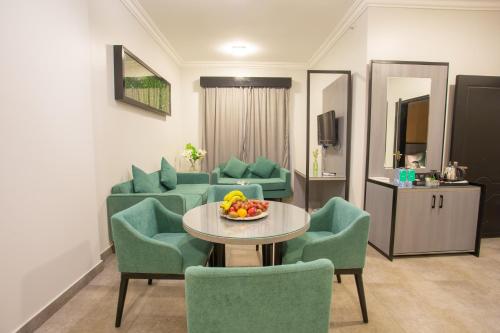 Χώρος καθιστικού στο Karims Hotel