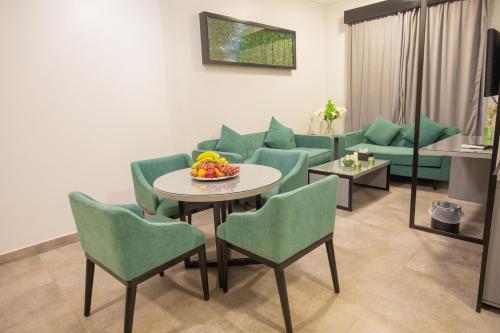 Χώρος καθιστικού στο Karims Hotel