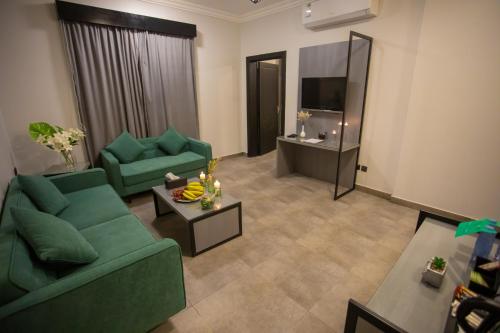 Χώρος καθιστικού στο Karims Hotel