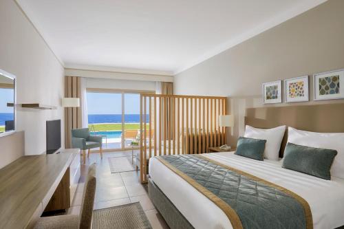 Cama o camas de una habitación en JAZ Elite Maraya
