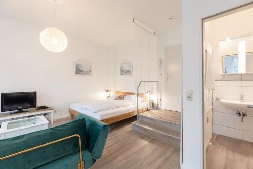 Ένα ή περισσότερα κρεβάτια σε δωμάτιο στο Ferienwohnung Die 8
