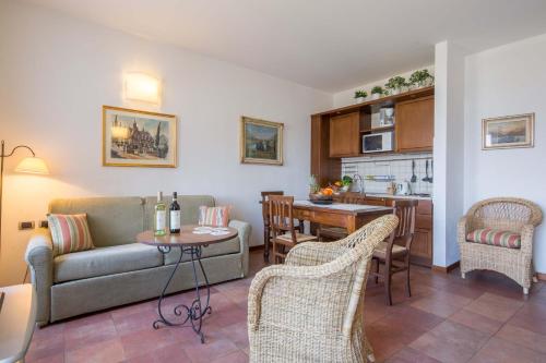 a living room with a couch and a table at Il Poggio Di Bellagio in Bellagio