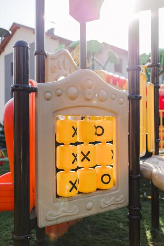 a childs cube on a playground at Villa Monica Apartamenty in Szczyrk