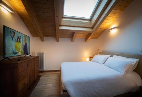 Ένα ή περισσότερα κρεβάτια σε δωμάτιο στο B&B Villa Cavallier
