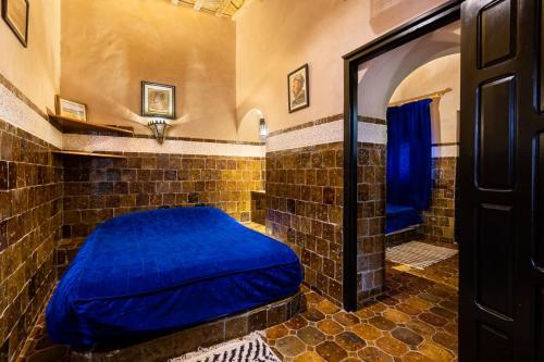 Hôtel Riad Dar Daïfにあるベッド