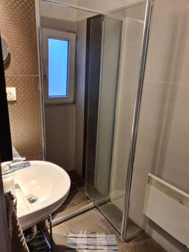a bathroom with a shower and a sink at Feeling home in the heart of Budapest in Budapest