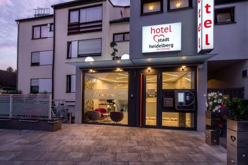 a hotel sign on the front of a building at Hotel Stadt Heidelberg in Darmstadt