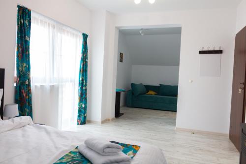Ένα ή περισσότερα κρεβάτια σε δωμάτιο στο Vila Sol