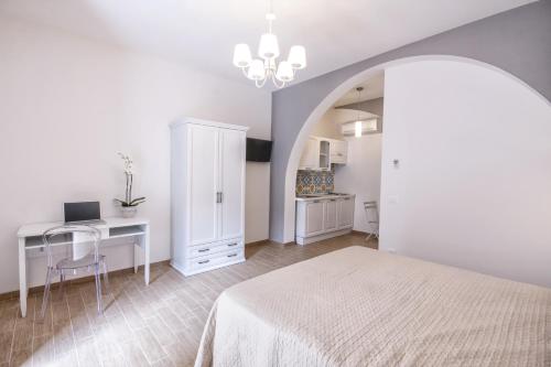 Giường trong phòng chung tại Residenza Le Zagare