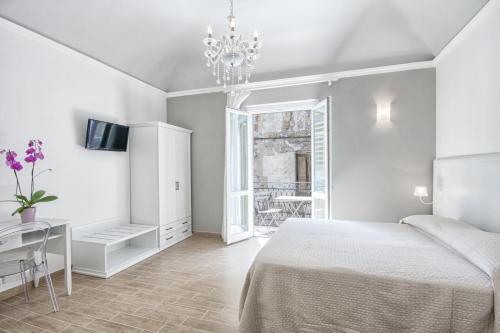 Giường trong phòng chung tại Residenza Le Zagare