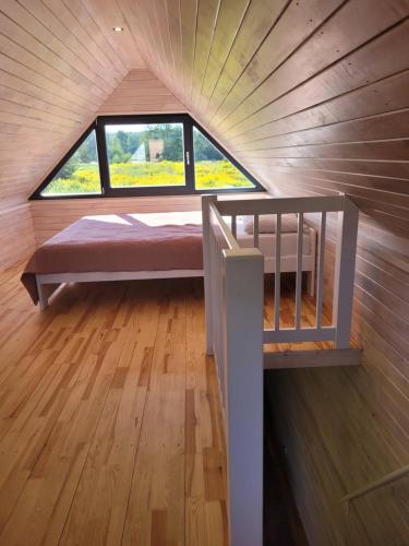 Letto o letti in una camera di Apartamenty EverySky - Domek Koło Karpacza