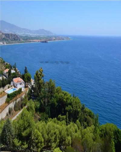 an aerial view of a large body of water at Hotel Salobreña Suites in Salobreña
