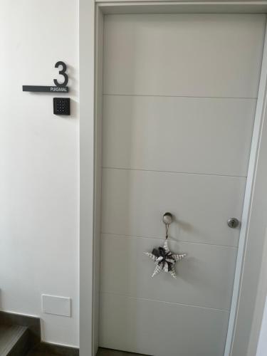 a room with a door with a star on it at ELS 4 PICS in Puigcerdà