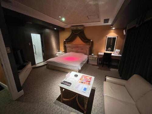 Кровать или кровати в номере Hotel Pharaoh-Adult Only