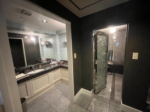 Ванная комната в Hotel Pharaoh-Adult Only