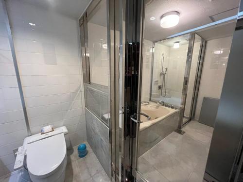 Ванная комната в Hotel Pharaoh-Adult Only