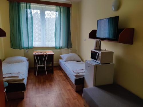 A television and/or entertainment centre at Rekreačné zariadenie Javorinka