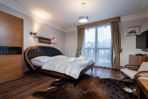 Ліжко або ліжка в номері TATRYSTAY Apartment Javor Tatranská Lomnica