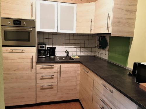 Η κουζίνα ή μικρή κουζίνα στο Ferienwohnung Bär