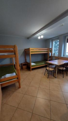 Posteľ alebo postele v izbe v ubytovaní Apartamenty Suzyw Pilsko