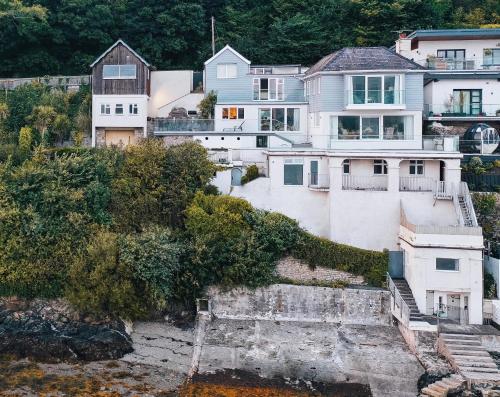 an aerial view of a house on a hill at The Ridge in Menai Bridge