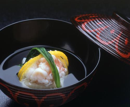 a bowl of food with shrimp and a lemon at Gora Kadan in Hakone