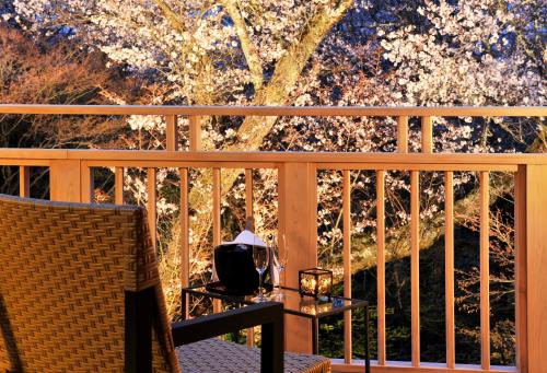 a view of a tree from the balcony of a house at Gora Kadan in Hakone