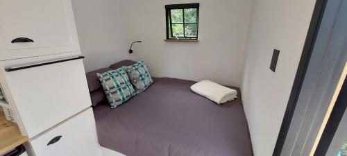 Ένα ή περισσότερα κρεβάτια σε δωμάτιο στο Luxury Shepherds Hut Farm Retreat