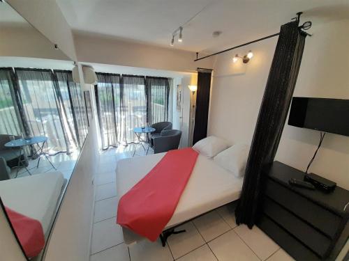 Posteľ alebo postele v izbe v ubytovaní Studio Village Naturiste Angel
