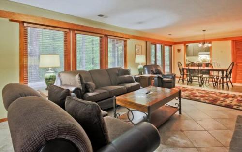 a living room with a couch and a table at Callaway Resort & Gardens in Pine Mountain