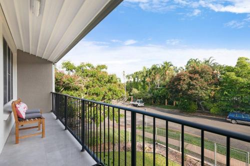 a balcony with a view of a street at 'Botanica Aguila' Chic Nightcliff Balcony Pad in Nightcliff
