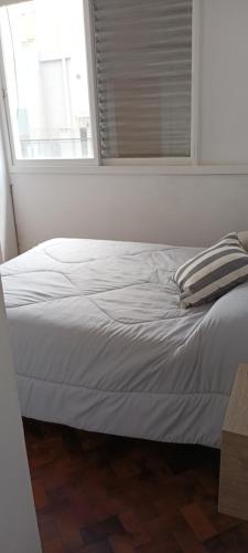 Una cama o camas en una habitación de DEPARTAMENTO PARQUE ESPAÑA