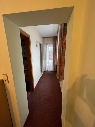 a hallway of a room with a hallway at Gästehaus Wallner in Presseggen