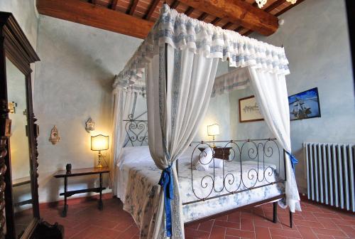 Ένα ή περισσότερα κρεβάτια σε δωμάτιο στο Agriturismo I Frati