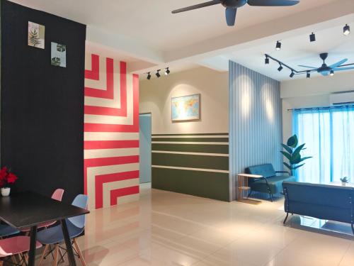 a living room with a table and chairs at Pavilionvillie M1T584 by irainbow in Simpang Pulai