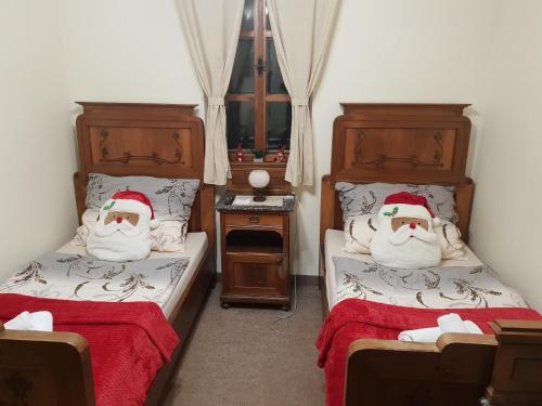Posteľ alebo postele v izbe v ubytovaní Penzión Šafran