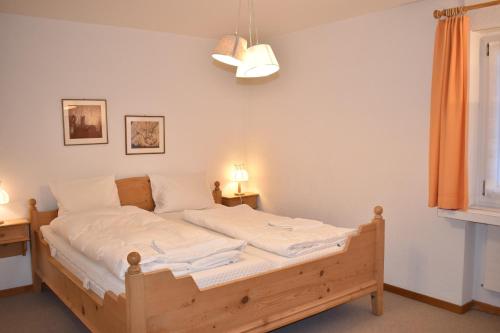 Ένα ή περισσότερα κρεβάτια σε δωμάτιο στο Lodola 298 1 Hk , Wohnung 1