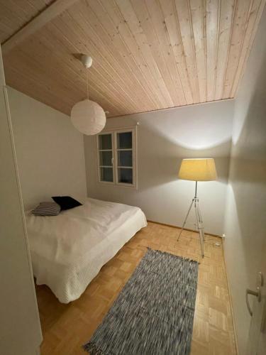 Postel nebo postele na pokoji v ubytování Nordic Home